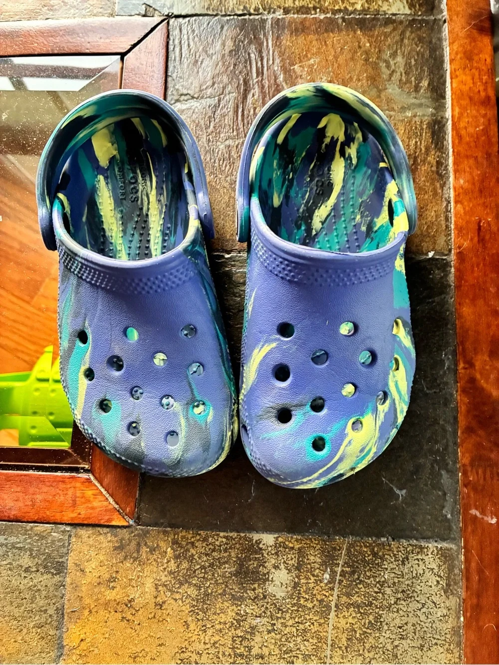 CROCS Kids Slip-On Clogs in Blue with Green and Yellow Swirl